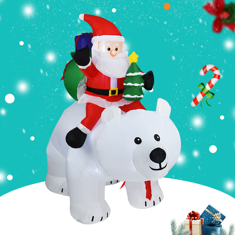 A Inflatable Santa Claus Riding Polar Bear