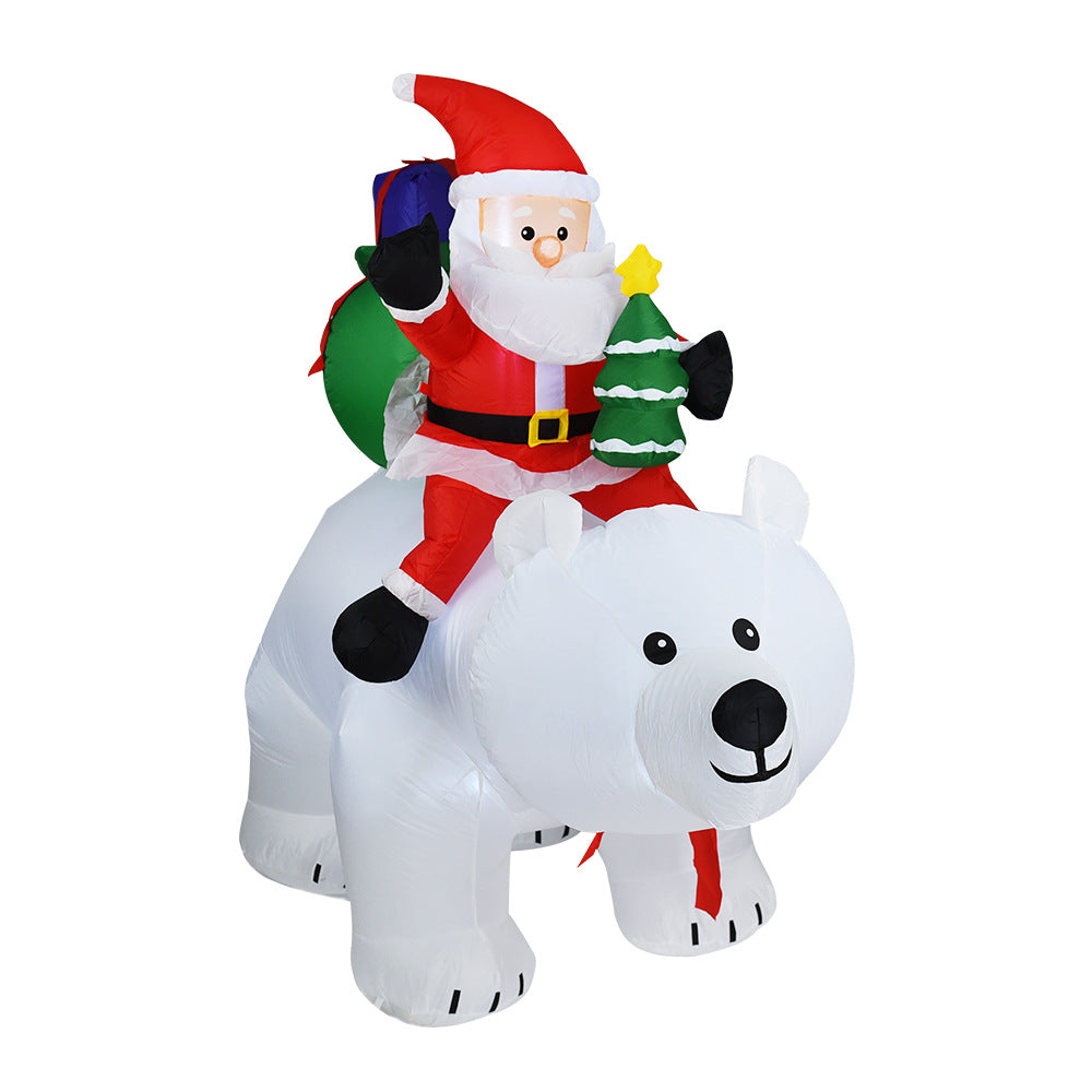 A Inflatable Santa Claus Riding Polar Bear