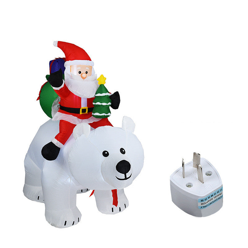A Inflatable Santa Claus Riding Polar Bear