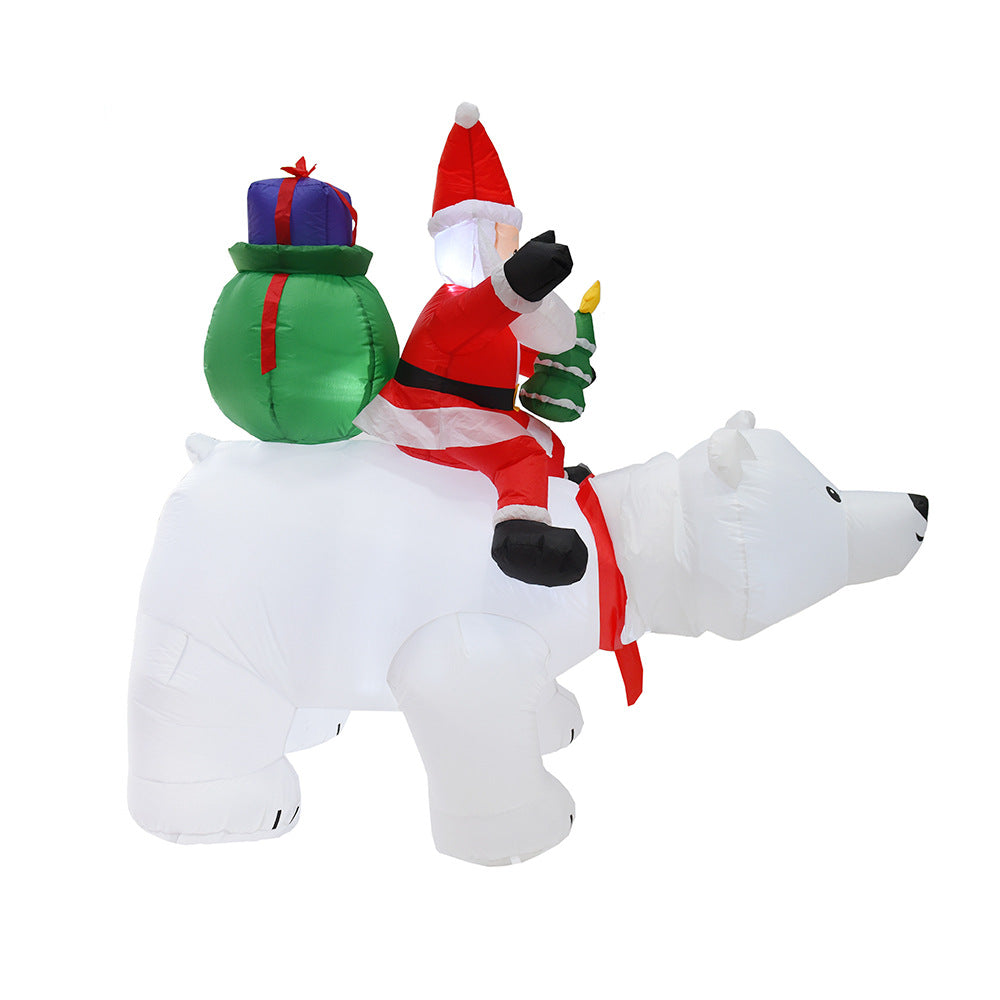 A Inflatable Santa Claus Riding Polar Bear
