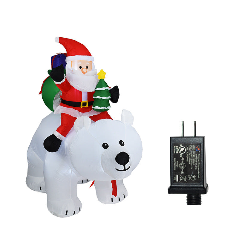 A Inflatable Santa Claus Riding Polar Bear