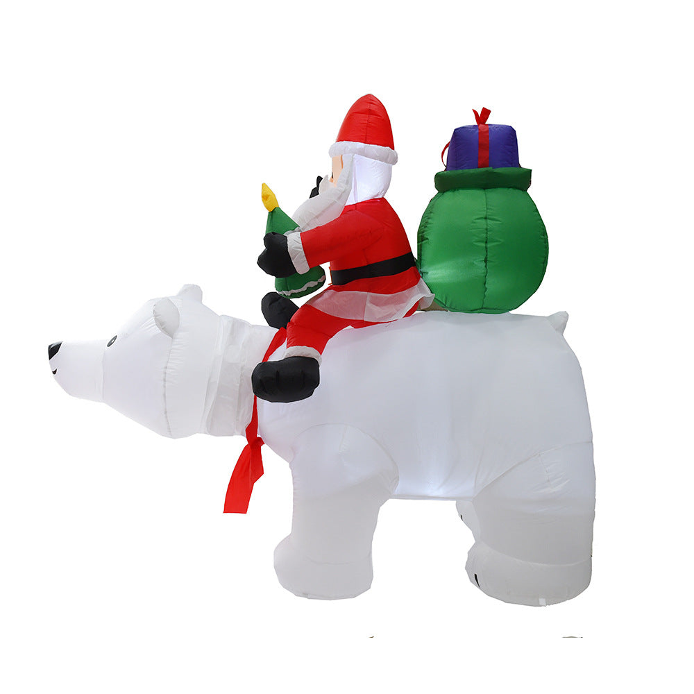 A Inflatable Santa Claus Riding Polar Bear