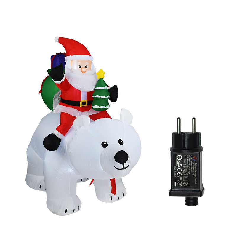 A Inflatable Santa Claus Riding Polar Bear