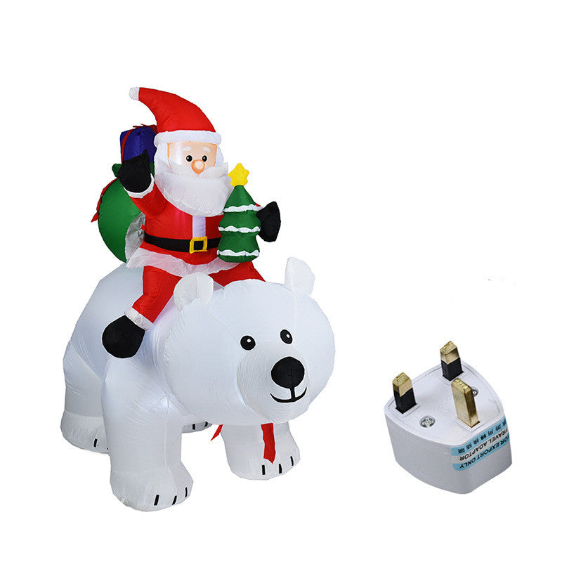 A Inflatable Santa Claus Riding Polar Bear